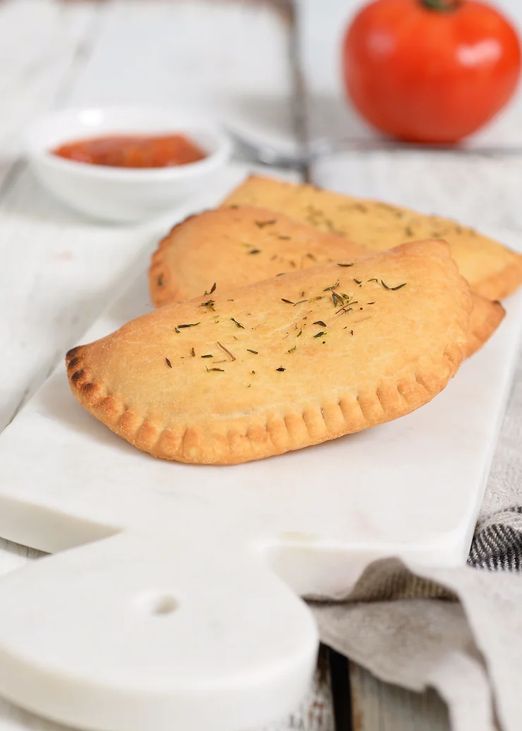 Cheesy vegan calzones