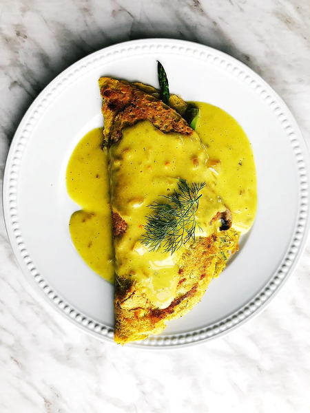 Plant-based chickpea "omelette" with Hollandaise sauce