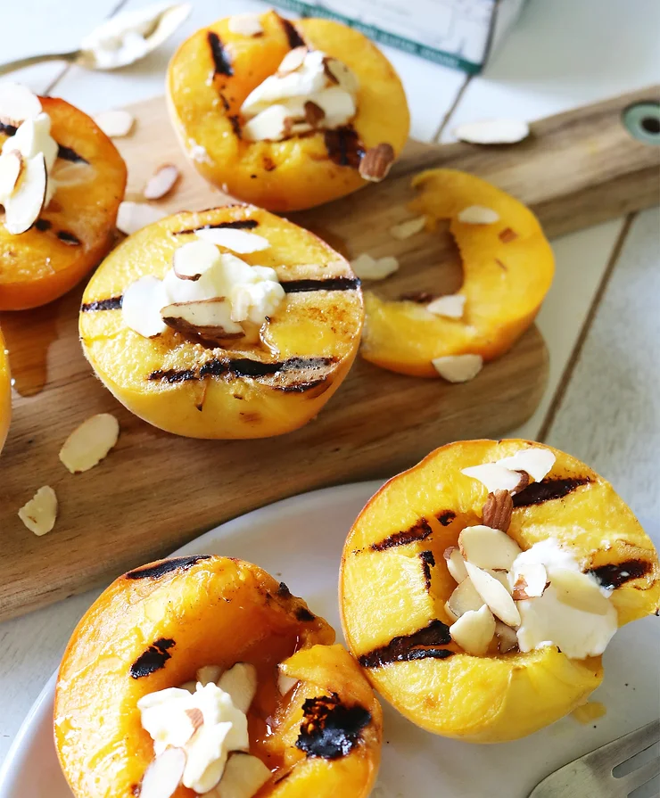 Grilled peaches topped with Brie (Double Crème)